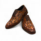 Sun Termeh brown leather and suede lace-up dress shoe with intricate hand-stitched swirl patterns. Photo of front view 1.