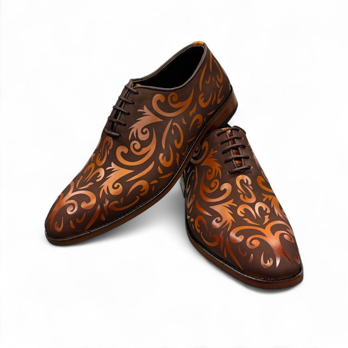 Sun Termeh brown leather and suede lace-up dress shoe with intricate hand-stitched swirl patterns. Photo of front view 1.