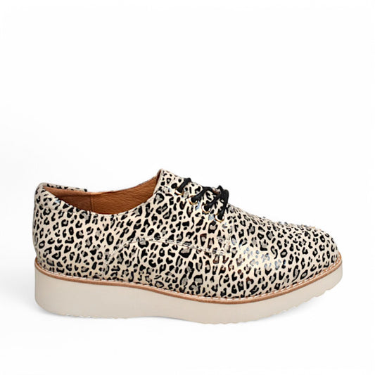 TAMARA/LONDON ADDICTION oxford shoes in glossy beige and black leopard print with a white platform sole