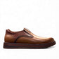 TATA brown leather slip-on shoes with handmade stitching and durable rubber outsole for formal wear.