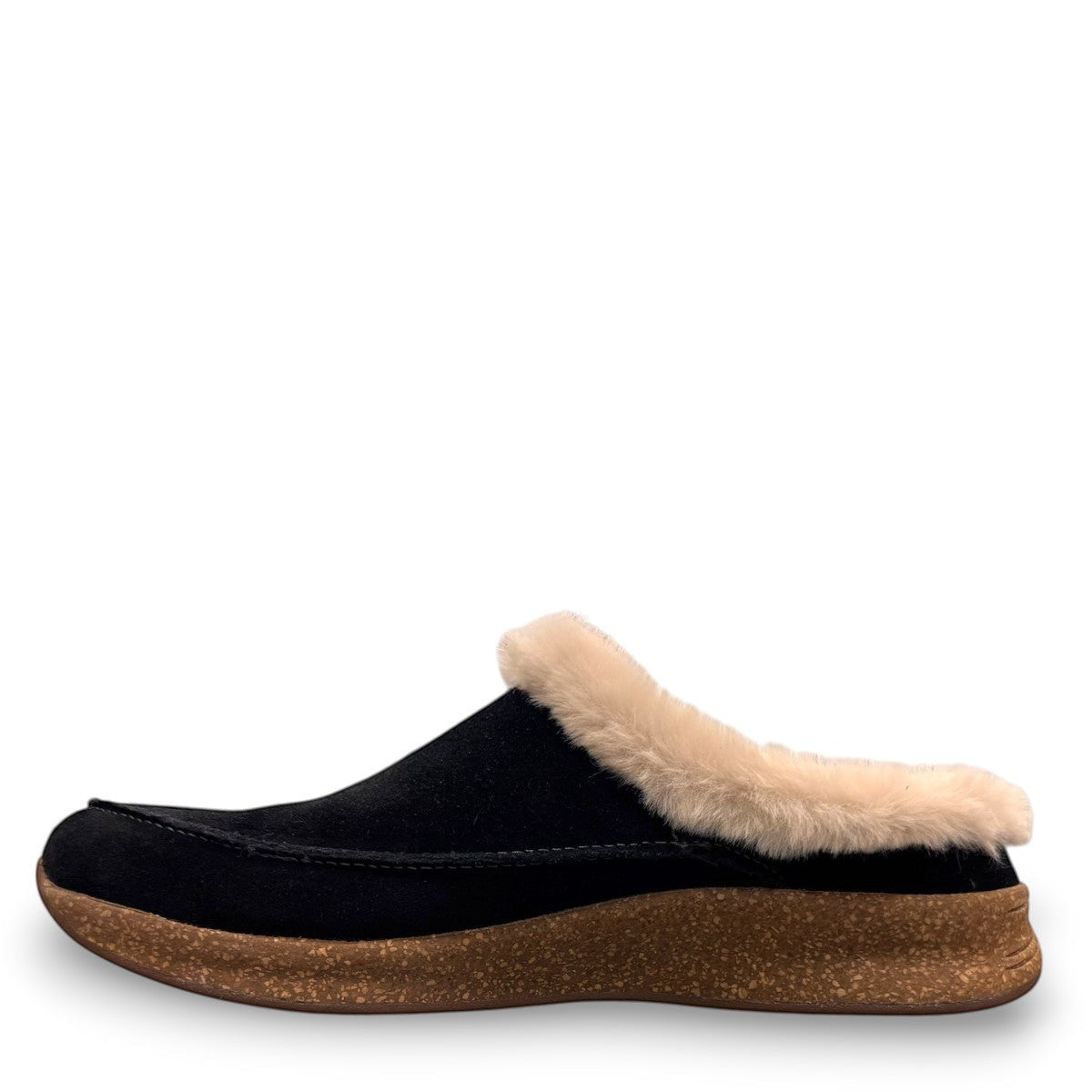 Taos Future black suede clog with soft faux fur lining and a supportive cork and EVA midsole. Photo of left side view.
