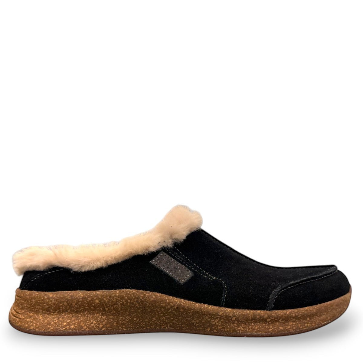 Taos Future black suede clog with soft faux fur lining and a supportive cork and EVA midsole. Photo of right side view.