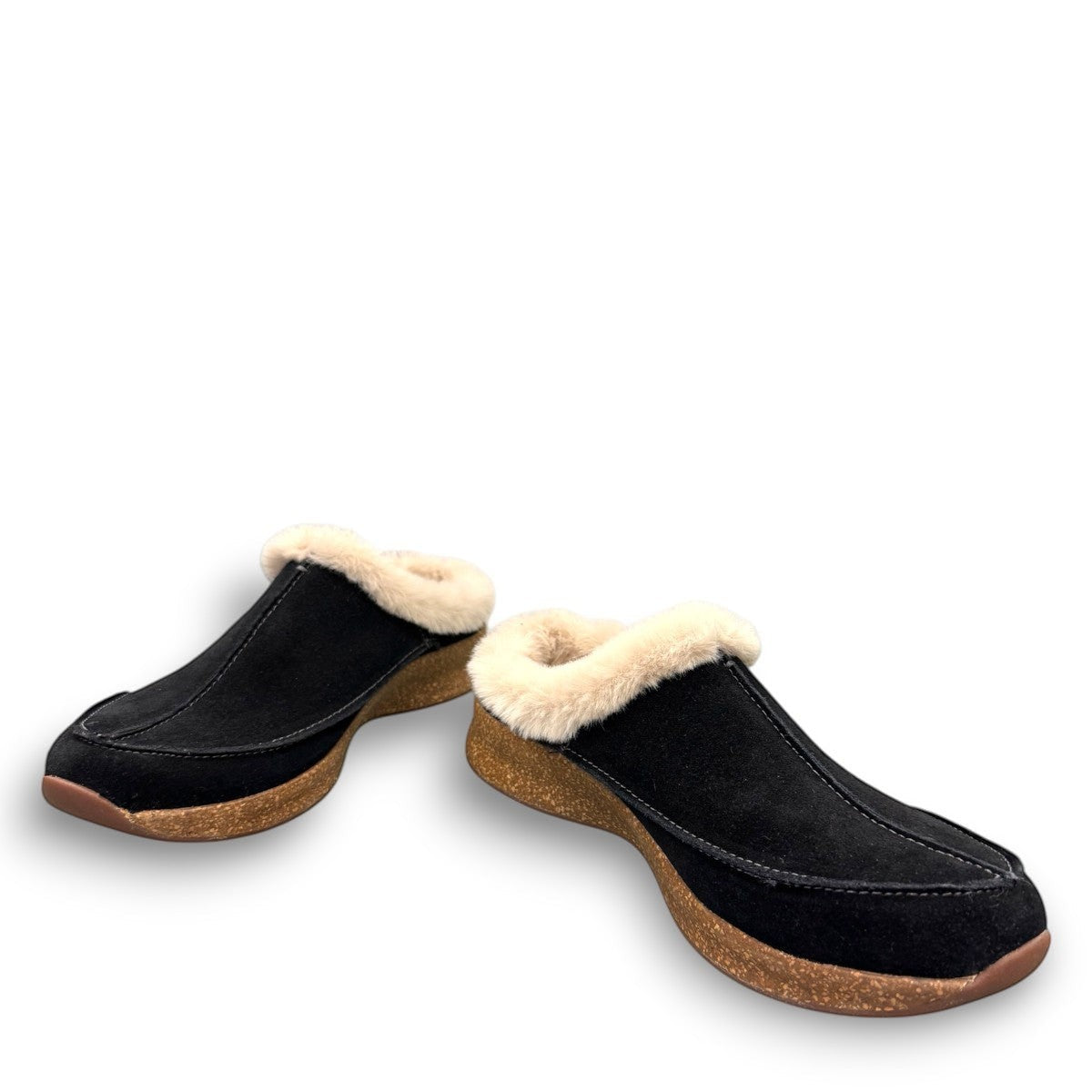 Taos Future black suede clog with soft faux fur lining and a supportive cork and EVA midsole. Photo of front view sides.