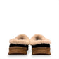 Taos Future black suede clog with soft faux fur lining and a supportive cork and EVA midsole. Photo of back view.