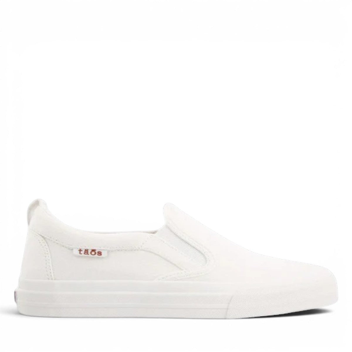 Taos Rubber Soul white canvas slip-on sneaker with platform sole and elastic gore. Photo of outside side view.