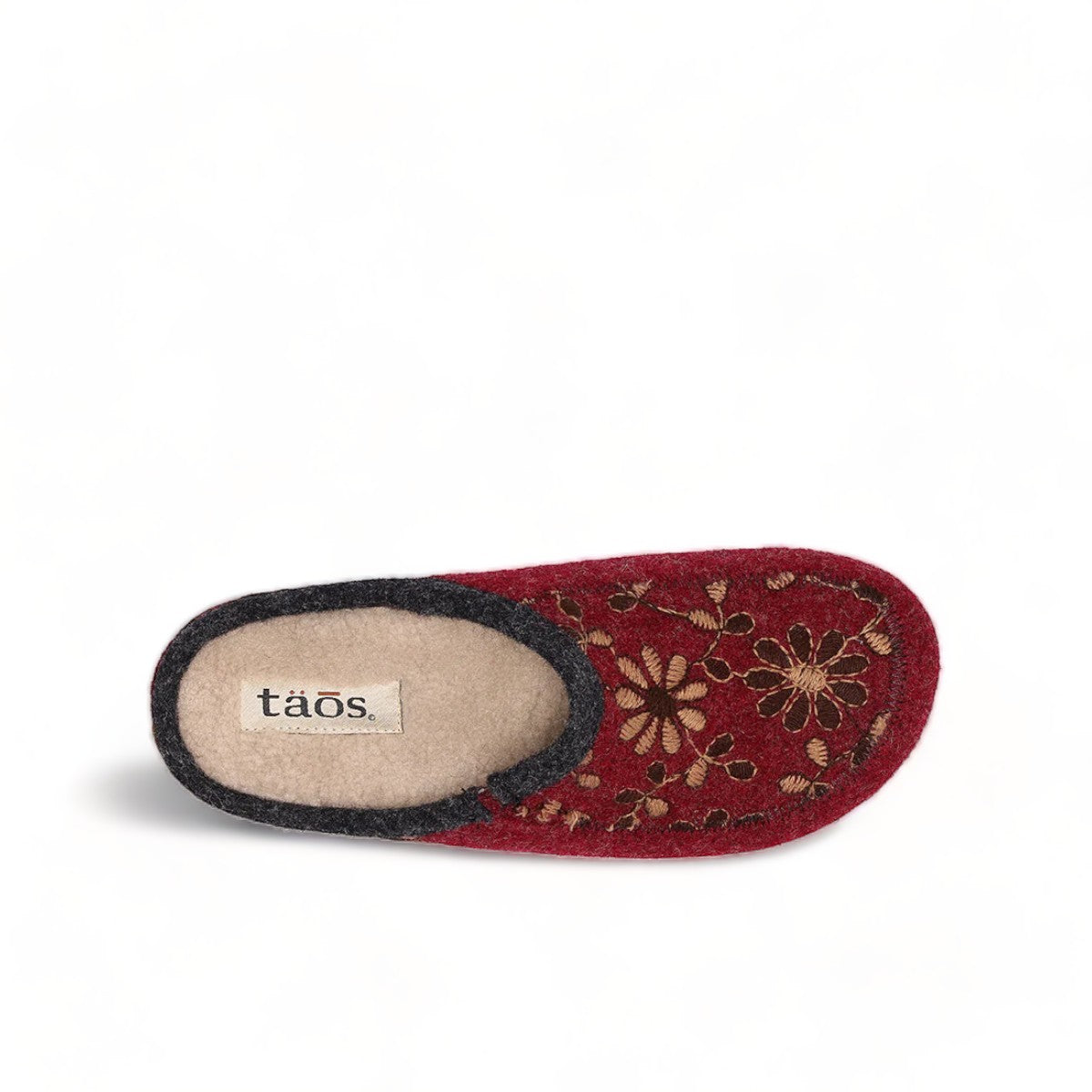 Taos Woolderness 2 cranberry wool clog with floral embroidery, faux fur lining, and cork midsole. Photo of upper view.