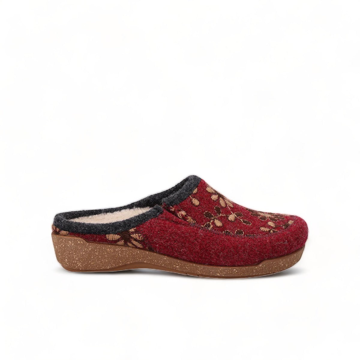 Taos Woolderness 2 cranberry wool clog with floral embroidery, faux fur lining, and cork midsole. Photo of left side view.