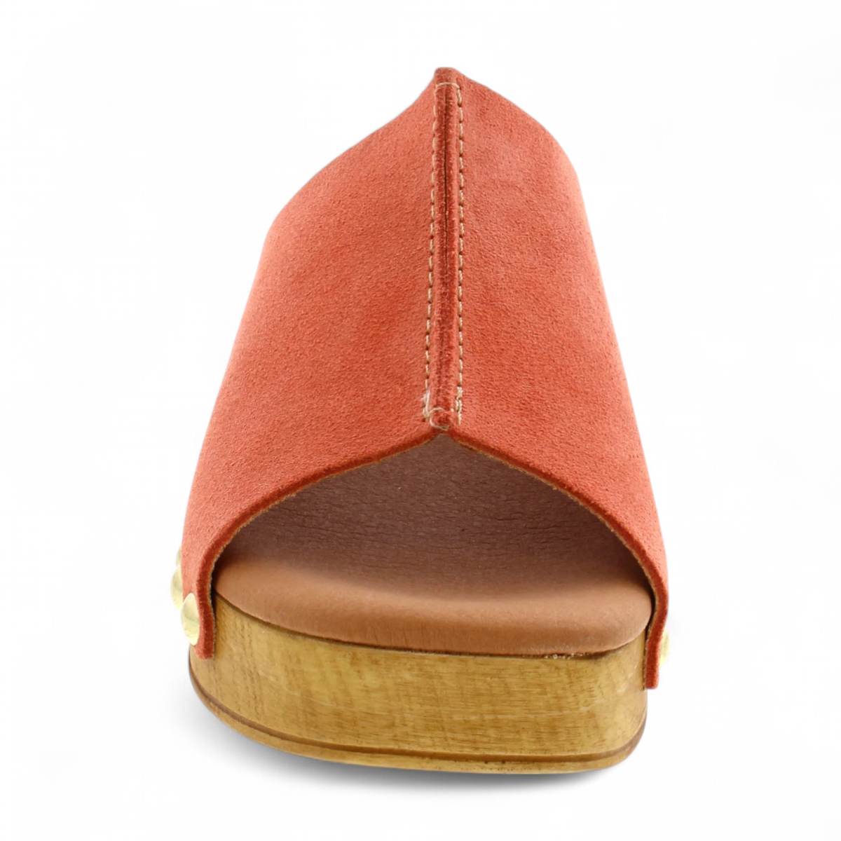 Tyche Bella coral leather slip-on clog with gold rivet accents and a wooden block heel. Photo of front view.