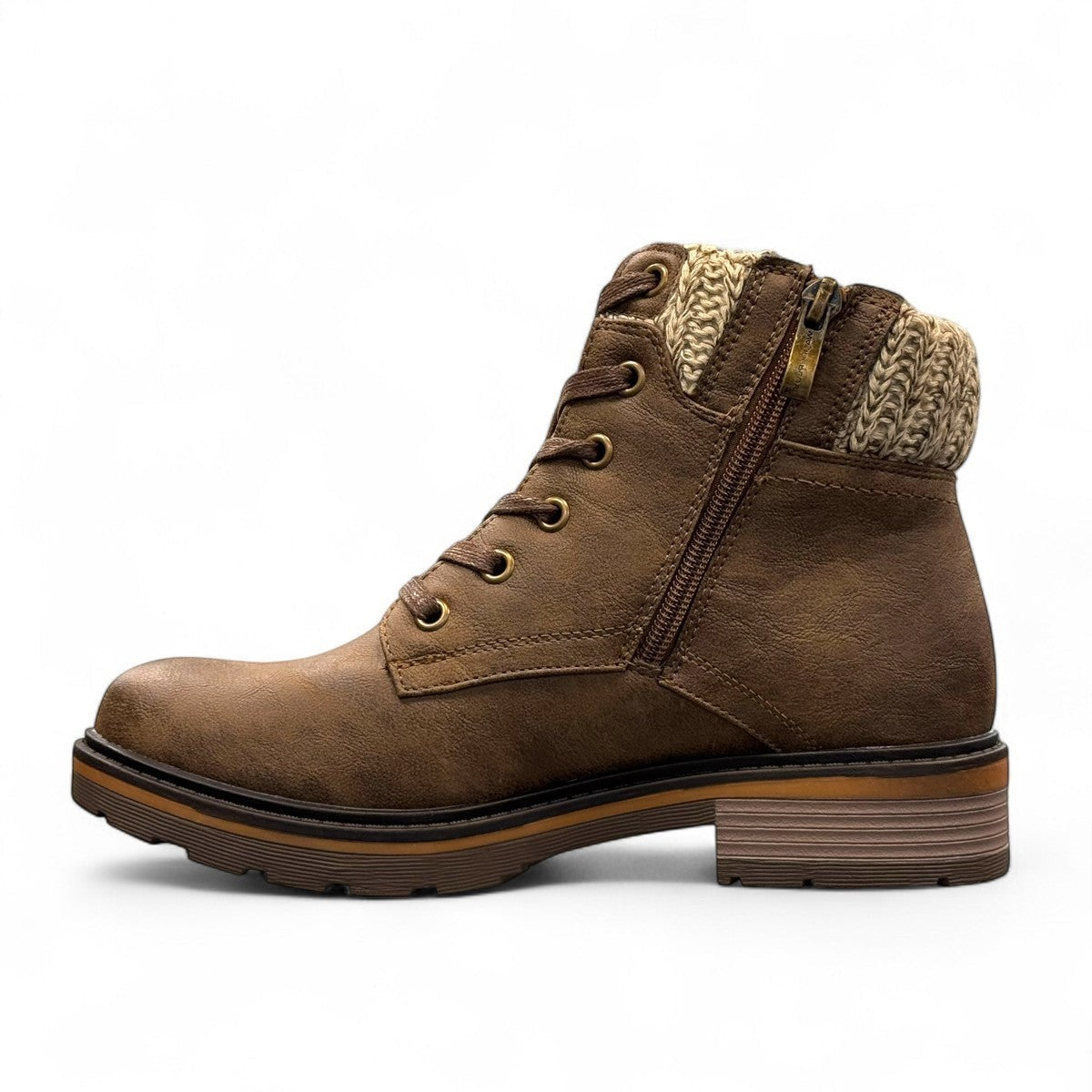 Wanderlust ankle boot in brown faux leather with a chunky knit cuff, side zipper, and lugged sole.
