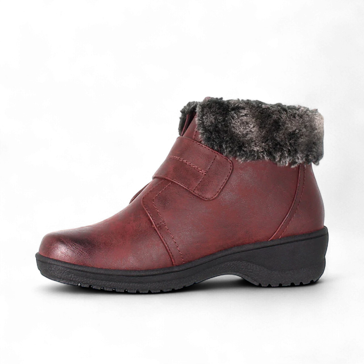 Wanderlust burgundy vegan winter boot with plush faux fur collar, velcro strap, and weather-resistant outsole.