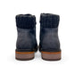 Wanderlust navy ankle boot with faux leather, chunky knit cuff, side zipper, lace-up closure, and lugged sole.