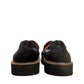 Aetrex Collette black leather loafer showing the durable, lightweight treaded outsole and heel.