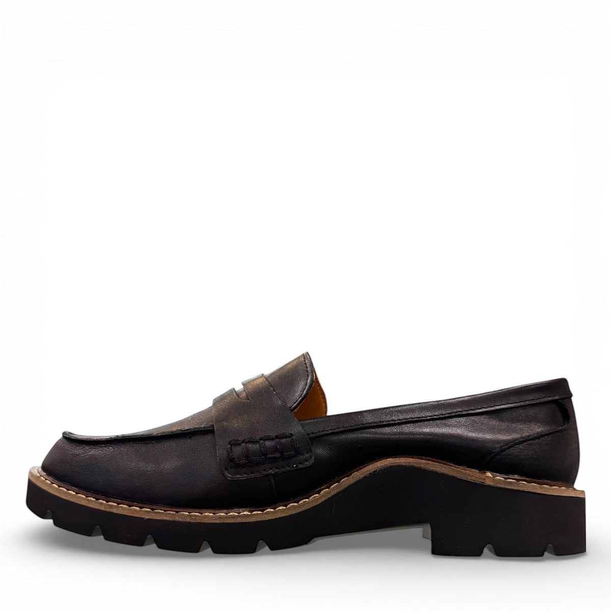 Aetrex Collette black leather loafer showing the durable, lightweight treaded outsole and heel.