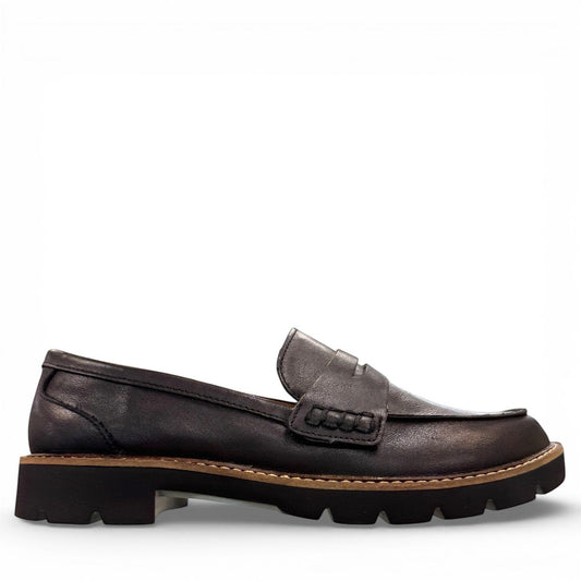 Aetrex Collette black leather loafer showing the durable, lightweight treaded outsole and heel.