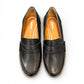 Aetrex Collette black leather loafer showing the durable, lightweight treaded outsole and heel.