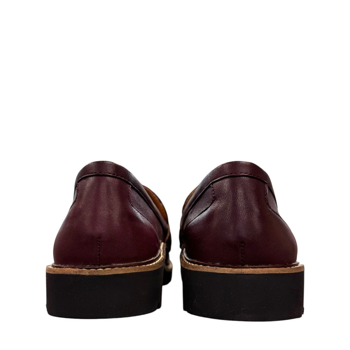 Aetrex Collette burgundy leather loafer showing the durable black lugged outsole and low heel profile.
