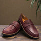 Aetrex Collette burgundy leather loafer showing the durable black lugged outsole and low heel profile.