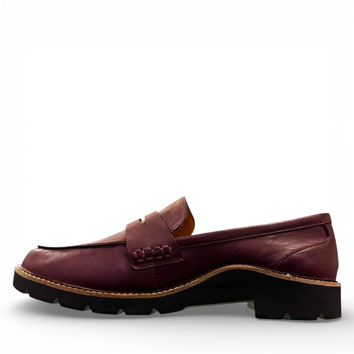Aetrex Collette burgundy leather loafer showing the durable black lugged outsole and low heel profile.