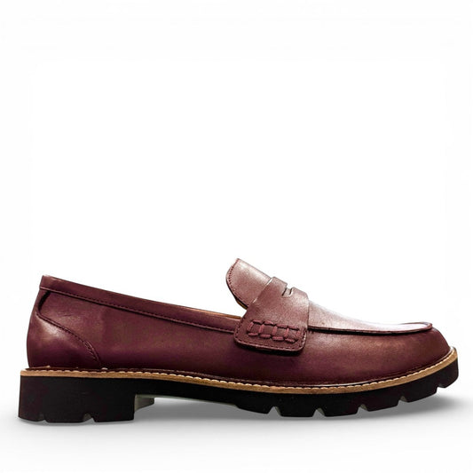 Aetrex Collette burgundy leather loafer showing the durable black lugged outsole and low heel profile.