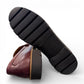 Aetrex Collette burgundy leather loafer showing the durable black lugged outsole and low heel profile.