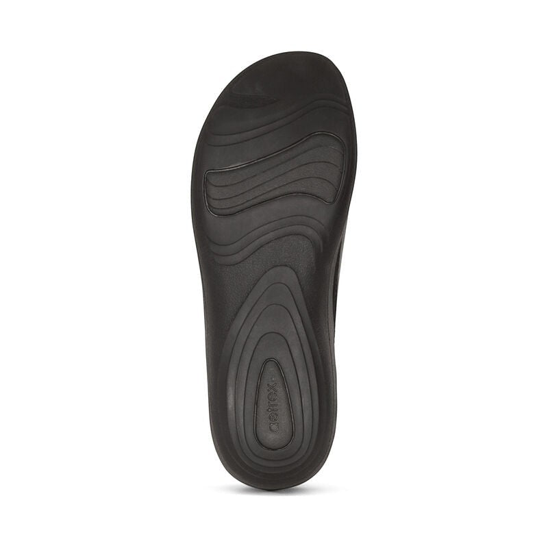 Aetrex Dana black leather lace-up sneaker with woven side detail and supportive orthotic arch design