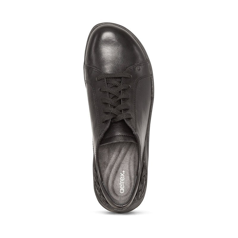Aetrex Dana black leather lace-up sneaker with woven side detail and supportive orthotic arch design
