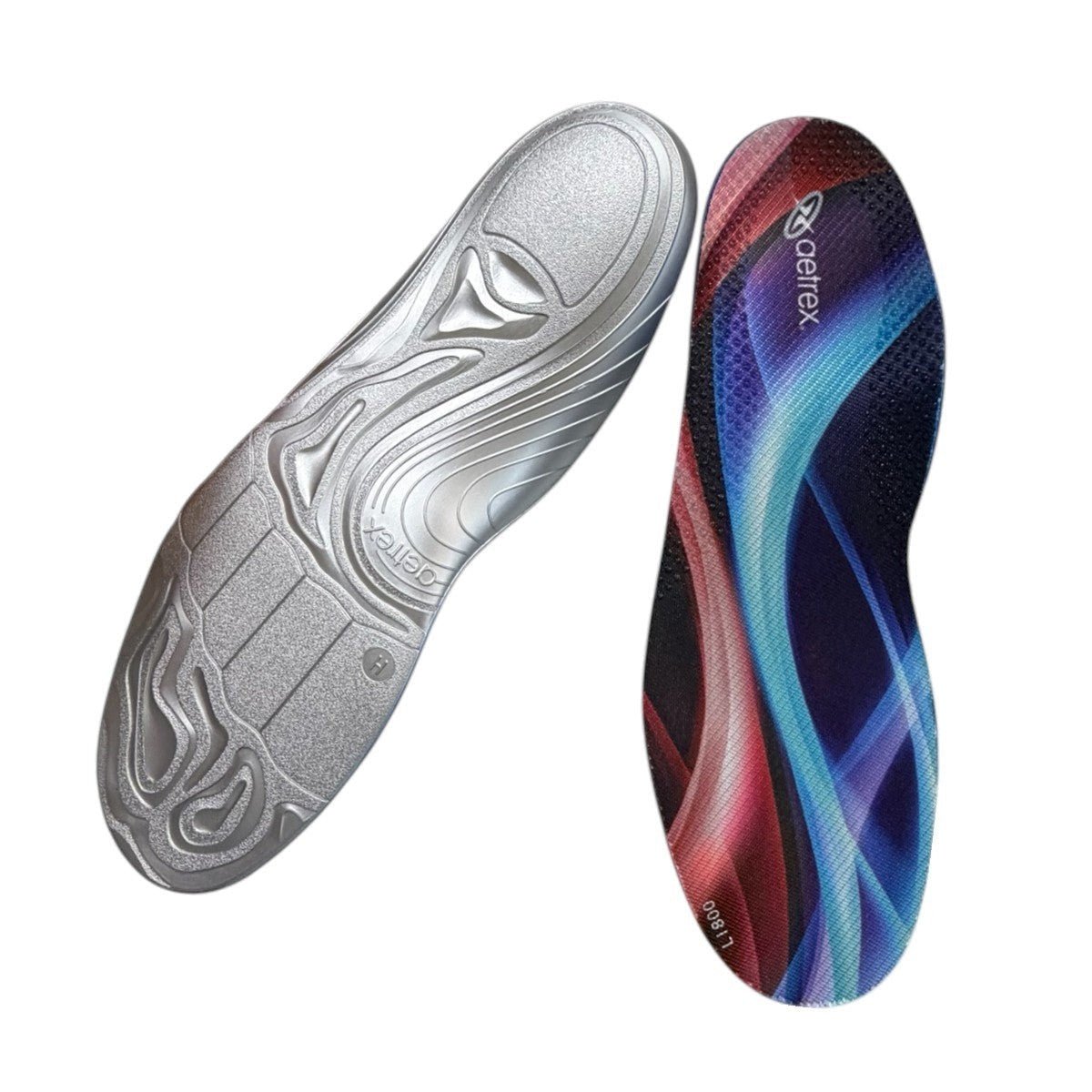 Aetrex Edge orthotic insole with a vibrant blue and red abstract wave pattern and microfiber top cover.