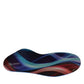 Aetrex Edge orthotic insole with a vibrant blue and red abstract wave pattern and microfiber top cover.