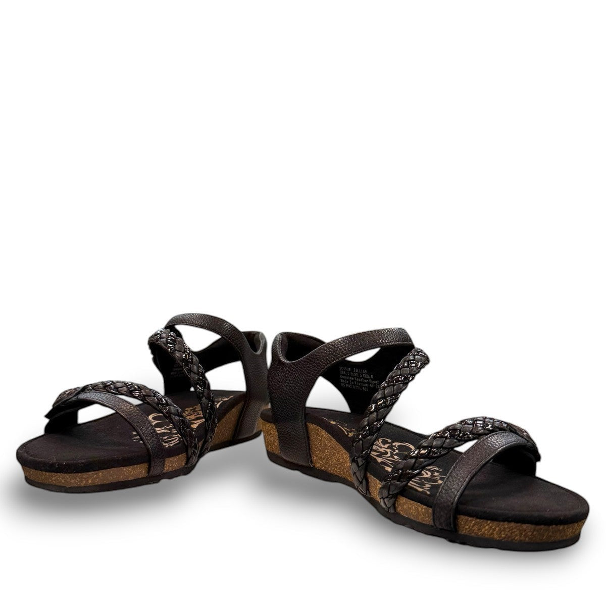 Aetrex Jillian black leather sandal showing the durable rubber outsole and cork midsole detail