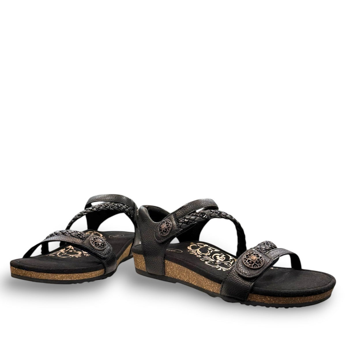 Aetrex Jillian black leather sandal showing the durable rubber outsole and cork midsole detail