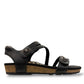 Aetrex Jillian black leather sandal showing the durable rubber outsole and cork midsole detail