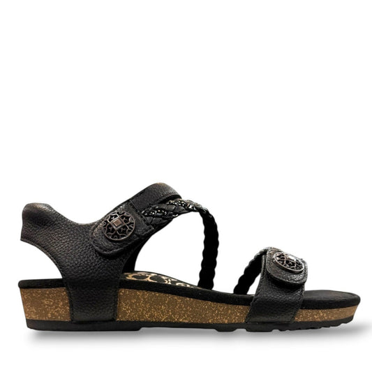 Aetrex Jillian black leather sandal showing the durable rubber outsole and cork midsole detail