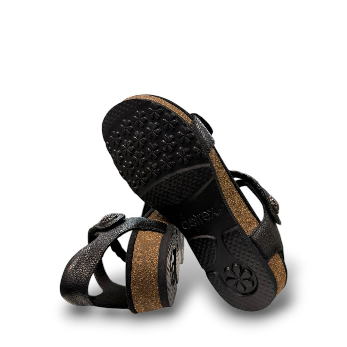 Aetrex Jillian black leather sandal showing the durable rubber outsole and cork midsole detail