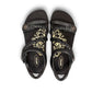 Aetrex Jillian black leather sandal showing the durable rubber outsole and cork midsole detail