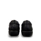 Aetrex Katie black leather casual shoe showing the durable rubber outsole and side zipper detail