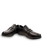 Aetrex Katie black leather casual shoe showing the durable rubber outsole and side zipper detail
