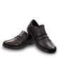 Aetrex Katie black leather casual shoe showing the durable rubber outsole and side zipper detail