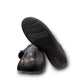 Aetrex Katie black leather casual shoe showing the durable rubber outsole and side zipper detail