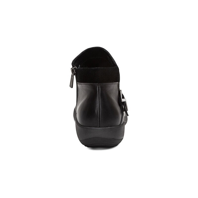Aetrex Luna black leather ankle boots with pleated detail, side zipper, and adjustable buckle.