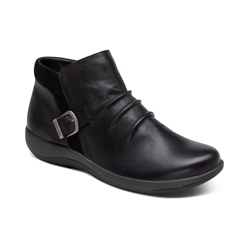 Aetrex Luna black leather ankle boots with pleated detail, side zipper, and adjustable buckle.