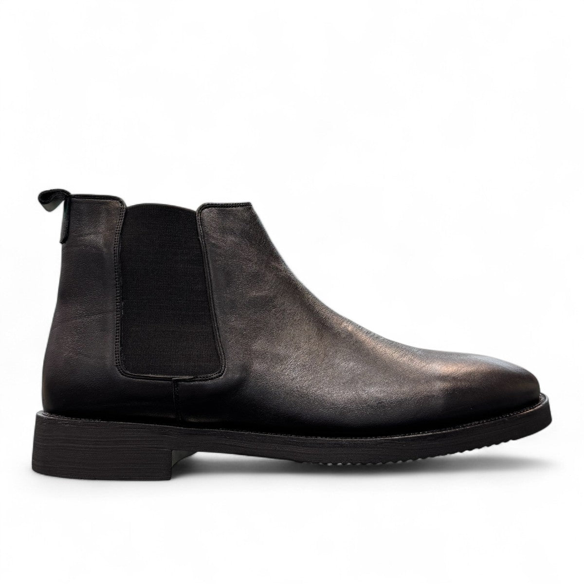 Agera Arta black leather Chelsea boots with elastic side panels and a durable rubber outsole. Photo of right side view.