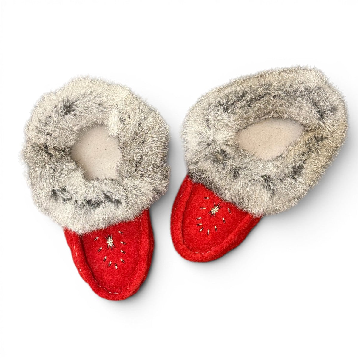 alberta red cowhide suede moccasins with a fluffy rabbit fur ankle collar, handcrafted for cozy comfort.
photo of the top side