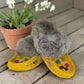 alberta-suede-moccasins yellow cowhide suede moccasins with a soft rabbit fur ankle collar, handcrafted for cozy comfort.
photo of the front side