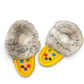 alberta-suede-moccasins yellow cowhide suede moccasins with a soft rabbit fur ankle collar, handcrafted for cozy comfort.
photo of the top side