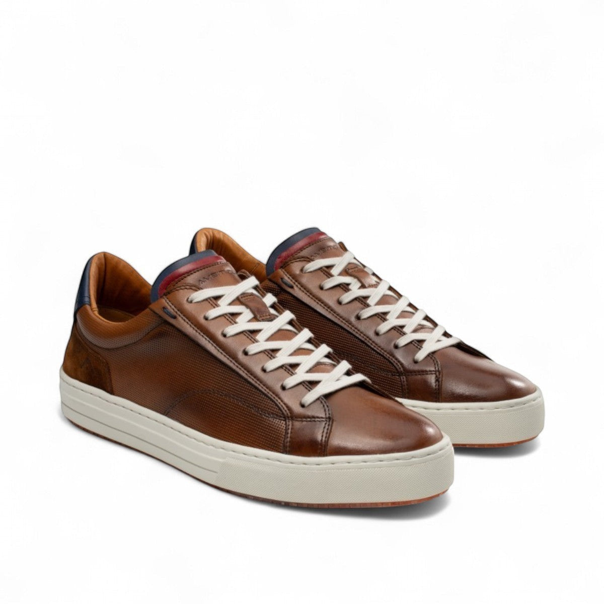AMBITIOUS camel leather lace-up sneaker with a minimalist design and a lightweight white sole.