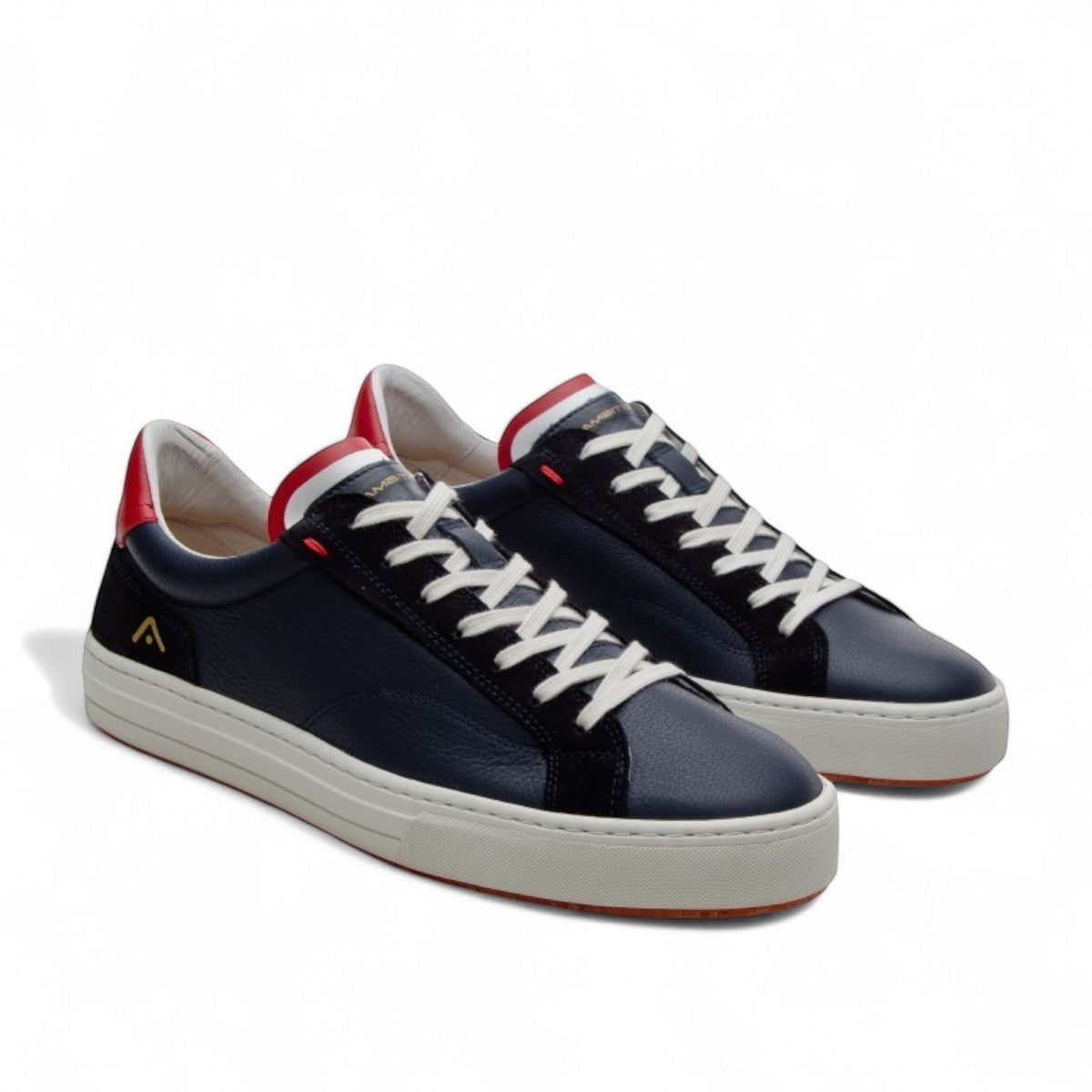 AMBITIOUS navy leather lace-up sneakers with white and red accents and a lightweight transparent sole