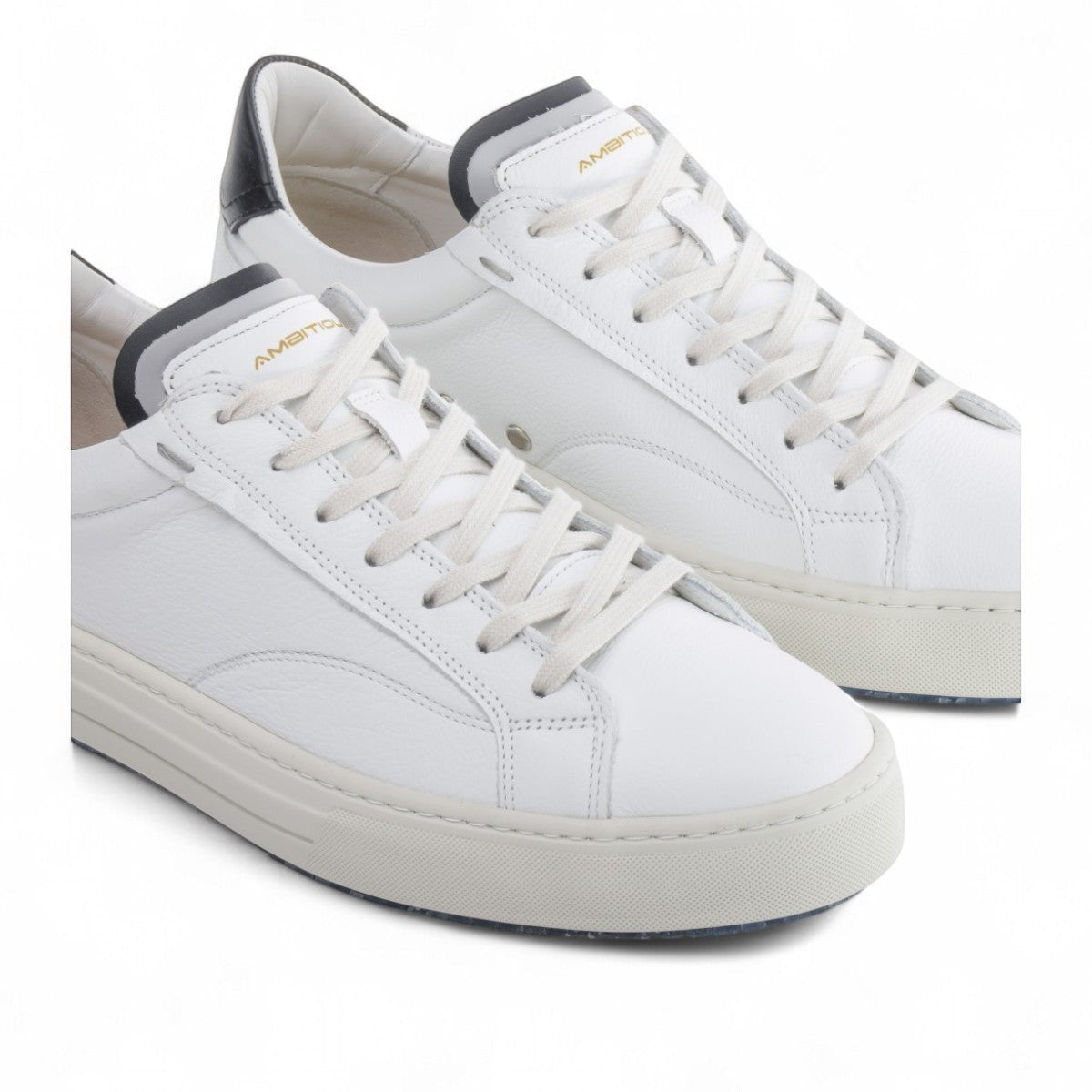 AMBITIOUS white leather lace-up sneaker with black heel tab and lightweight transparent sole