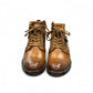 Sina Footwear Anzali 2 tan leather lace-up boots with side buckle detail, rubber outsole, and refined stitching. Photo of front view.