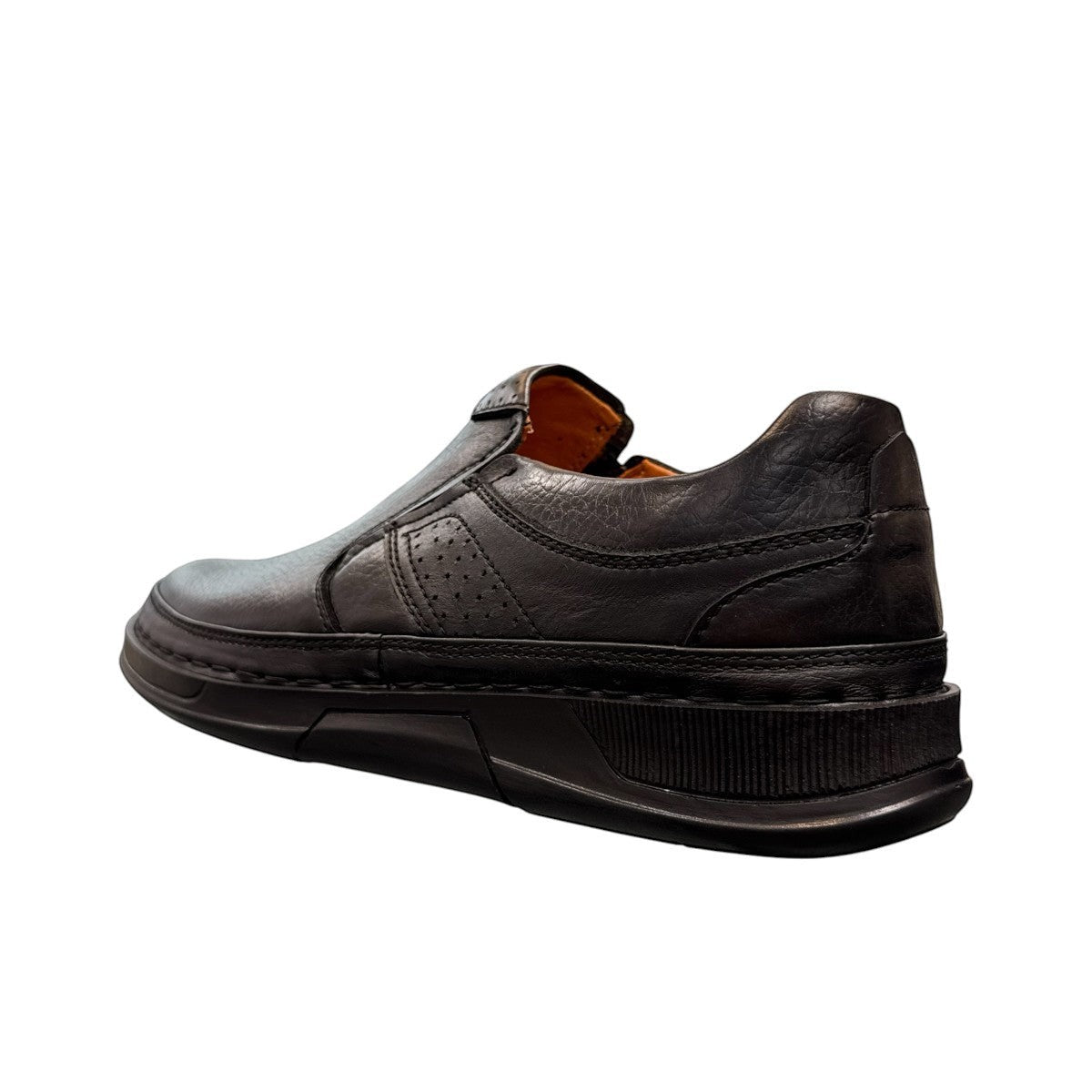 Atropat Abyaneh black leather slip-on shoes with handmade stitching and durable rubber outsole. Photo of side view from the back.