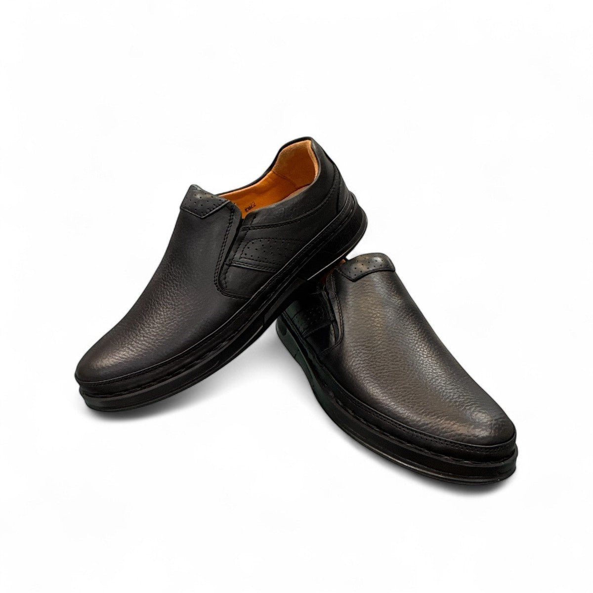 Atropat Abyaneh black leather slip-on shoes with handmade stitching and durable rubber outsole. Photo of upper view at an angle.